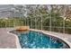 Enjoy this lovely pool and spa with a screened enclosure at 7800 18Th W Ave, Bradenton, FL 34209