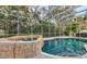 Relaxing screened pool and spa area with brick pavers at 7800 18Th W Ave, Bradenton, FL 34209