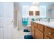 Clean bathroom with double vanity, bathtub, and shower at 8532 Eagle Preserve Way, Sarasota, FL 34241