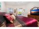 Spacious main bedroom with access to the backyard and a large dresser at 8532 Eagle Preserve Way, Sarasota, FL 34241