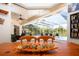 Bright breakfast nook with a view of the backyard and pool at 8532 Eagle Preserve Way, Sarasota, FL 34241