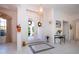 Bright and spacious entryway with tile flooring, double doors, and decorative accents at 8532 Eagle Preserve Way, Sarasota, FL 34241