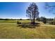 Golf course with cart path, lush green grass and trees at 8532 Eagle Preserve Way, Sarasota, FL 34241