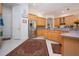 Modern kitchen with stainless steel refrigerator and ample counter space at 8532 Eagle Preserve Way, Sarasota, FL 34241
