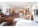 Open concept living room, kitchen, and pool access at 8532 Eagle Preserve Way, Sarasota, FL 34241