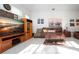Living room with comfortable leather seating and large TV at 8532 Eagle Preserve Way, Sarasota, FL 34241