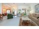 Spacious living room with comfortable seating and access to other rooms at 8532 Eagle Preserve Way, Sarasota, FL 34241