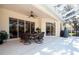 Spacious patio with outdoor dining set and pool view at 8532 Eagle Preserve Way, Sarasota, FL 34241