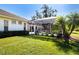 Screened pool and lanai with lush landscaping at 8532 Eagle Preserve Way, Sarasota, FL 34241