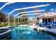 Large pool and spa perfect for relaxation in screened enclosure at 8532 Eagle Preserve Way, Sarasota, FL 34241