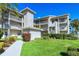 Two-story condo building with manicured landscaping at 9620 Club South Cir # 5106, Sarasota, FL 34238