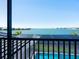 Peaceful balcony overlooking the lake and community pool at 991 Seascape Pl, Sarasota, FL 34240