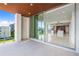 Step outside onto this balcony and enjoy views of the city and water at 111 Golden Gate Pt # 403, Sarasota, FL 34236