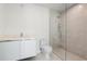 Clean bathroom with a walk-in shower at 111 Golden Gate Pt # 403, Sarasota, FL 34236