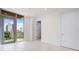 Bright bedroom with large window and city view at 111 Golden Gate Pt # 403, Sarasota, FL 34236