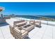Stunning water views from this rooftop seating area at 111 Golden Gate Pt # 403, Sarasota, FL 34236