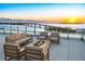 Enjoy sunsets from this rooftop terrace with firepit and seating at 111 Golden Gate Pt # 403, Sarasota, FL 34236