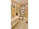 Bathroom with tub, shower, and updated vanity at 11485 Oakhurst Rd # 200-220, Largo, FL 33774
