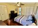 Bedroom with double bed, built in shelving and lots of closet space at 11485 Oakhurst Rd # 200-220, Largo, FL 33774