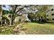 Landscaped path meanders through community grounds at 11485 Oakhurst Rd # 200-220, Largo, FL 33774