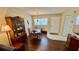 Dining area with wood flooring and built-in hutch at 11485 Oakhurst Rd # 200-220, Largo, FL 33774