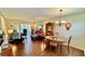 Charming dining area with wood table and flooring at 11485 Oakhurst Rd # 200-220, Largo, FL 33774