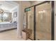 Shower with glass enclosure and a view into a bedroom at 12253 Marsh Pointe Rd, Sarasota, FL 34238