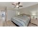 Main bedroom with walk-in closet and ceiling fan at 13479 Newport Ave, Port Charlotte, FL 33981