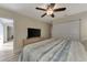Primary bedroom with TV and walk-in closet at 13479 Newport Ave, Port Charlotte, FL 33981