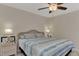 Spacious bedroom with ceiling fan and large bed at 13479 Newport Ave, Port Charlotte, FL 33981