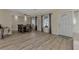 Dining area with laminate floors and a table with six chairs at 13479 Newport Ave, Port Charlotte, FL 33981