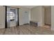 Bright entryway with laminate flooring, a window, and a bench at 13479 Newport Ave, Port Charlotte, FL 33981