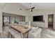 Living room with sectional sofa and custom wood table at 13479 Newport Ave, Port Charlotte, FL 33981