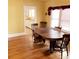 Dining room with hardwood floors and a view of the kitchen at 1667 Laurel St, Sarasota, FL 34236