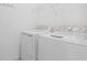 Laundry room with washer and dryer at 17665 Boracay Ct # 202, Venice, FL 34293