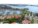 Stunning aerial view of waterfront homes with a private marina and beautiful water views at 312 Yacht Harbor Dr, Osprey, FL 34229