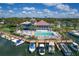 Luxury community clubhouse with pool and boat docks, offering resort-style living at 312 Yacht Harbor Dr, Osprey, FL 34229