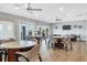 Community room with several round tables and comfortable seating at 312 Yacht Harbor Dr, Osprey, FL 34229