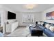 Comfortable living room with modern decor, plush seating, and a cozy atmosphere at 312 Yacht Harbor Dr, Osprey, FL 34229