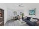 Cozy living room features a desk area with large windows that bring in lots of natural light at 312 Yacht Harbor Dr, Osprey, FL 34229