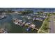 Aerial view of a full-service marina with many boats and docks at 312 Yacht Harbor Dr, Osprey, FL 34229