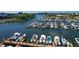 Aerial view of a full-service marina with many boats and docks at 312 Yacht Harbor Dr, Osprey, FL 34229