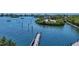 Elevated view of a boardwalk, waterway and boats at 312 Yacht Harbor Dr, Osprey, FL 34229