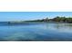 Stunning waterfront view with a pier and calm water at 333 N Shore Dr, Sarasota, FL 34234