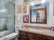 Bathroom with granite countertop and updated vanity at 3888 Shady Brook Ln, Sarasota, FL 34243
