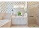 Bathroom features double vanity, shower, and garden tub at 4451 Legacy Ct, Sarasota, FL 34241