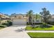 One-story home with attached garage and palm trees at 4451 Legacy Ct, Sarasota, FL 34241