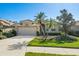 Exterior view of a single-story home with a two-car garage at 4451 Legacy Ct, Sarasota, FL 34241