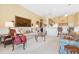 Living area with comfortable seating and large artwork at 4451 Legacy Ct, Sarasota, FL 34241
