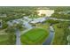 Golf clubhouse with parking and green at 4762 Meredith Ln, Sarasota, FL 34241